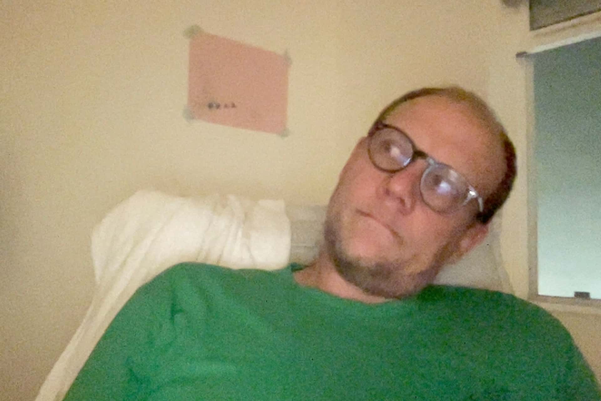 Eric in a green shirt looking at the h1 to the left